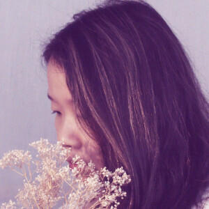 Profile picture side view of website owner's face with dried baby's breath